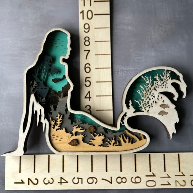 Mermaid made with six laser cut layers painted to create an amazing undersea scene.