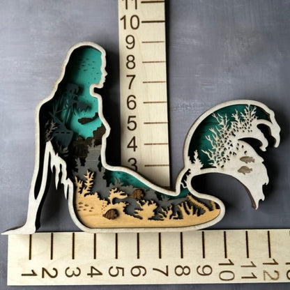 Mermaid made with six laser cut layers painted to create an amazing undersea scene.