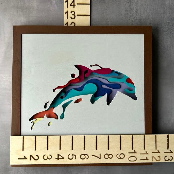 Multi-color, multi-layer laser cut wood dolphin with a liquid fill effect with measurements