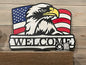 American Eagle with USA Flag background and "Welcome" text sitting on a mantel