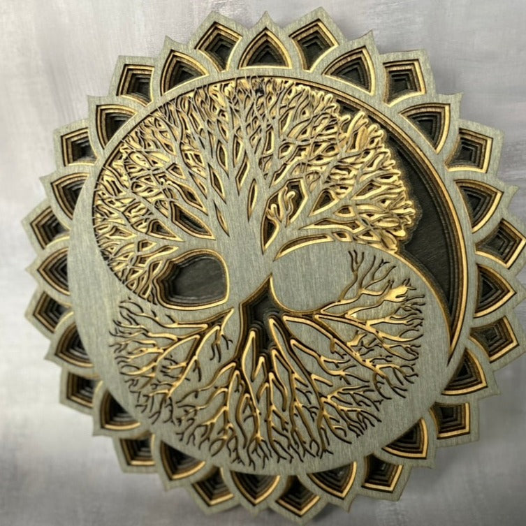 Grey, tan and black tree of life on a grey background