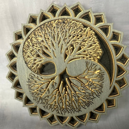 Grey, tan and black tree of life on a grey background