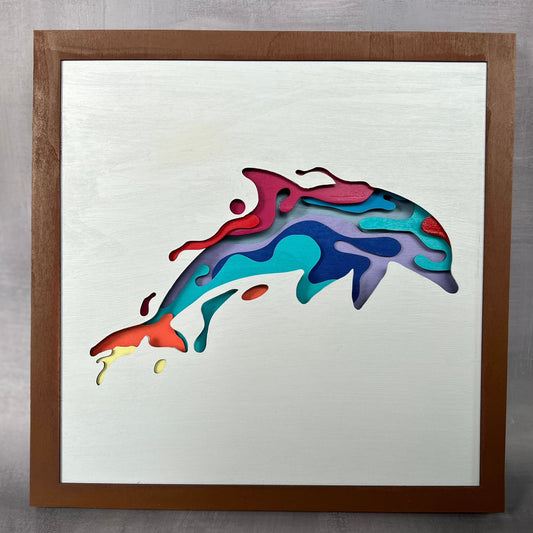 Multi-color, multi-layer laser cut wood dolphin with a liquid fill effect