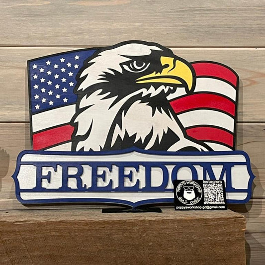 American Eagle with USA Flag background and "Freedom" text sitting on a mantel