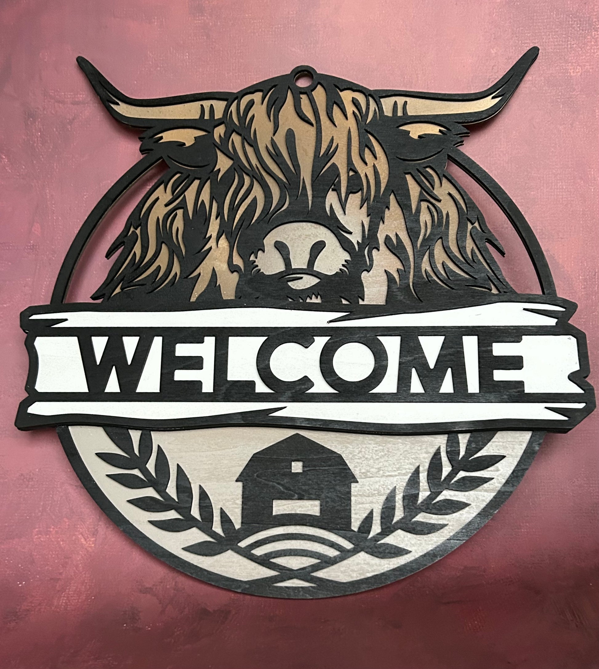 Hyland Cow Welcome sign with maroon background