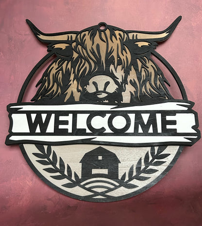 Hyland Cow Welcome sign with maroon background