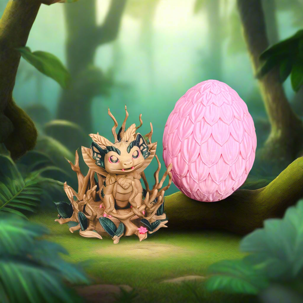 Dragon figurine and pink egg on a wooden surface