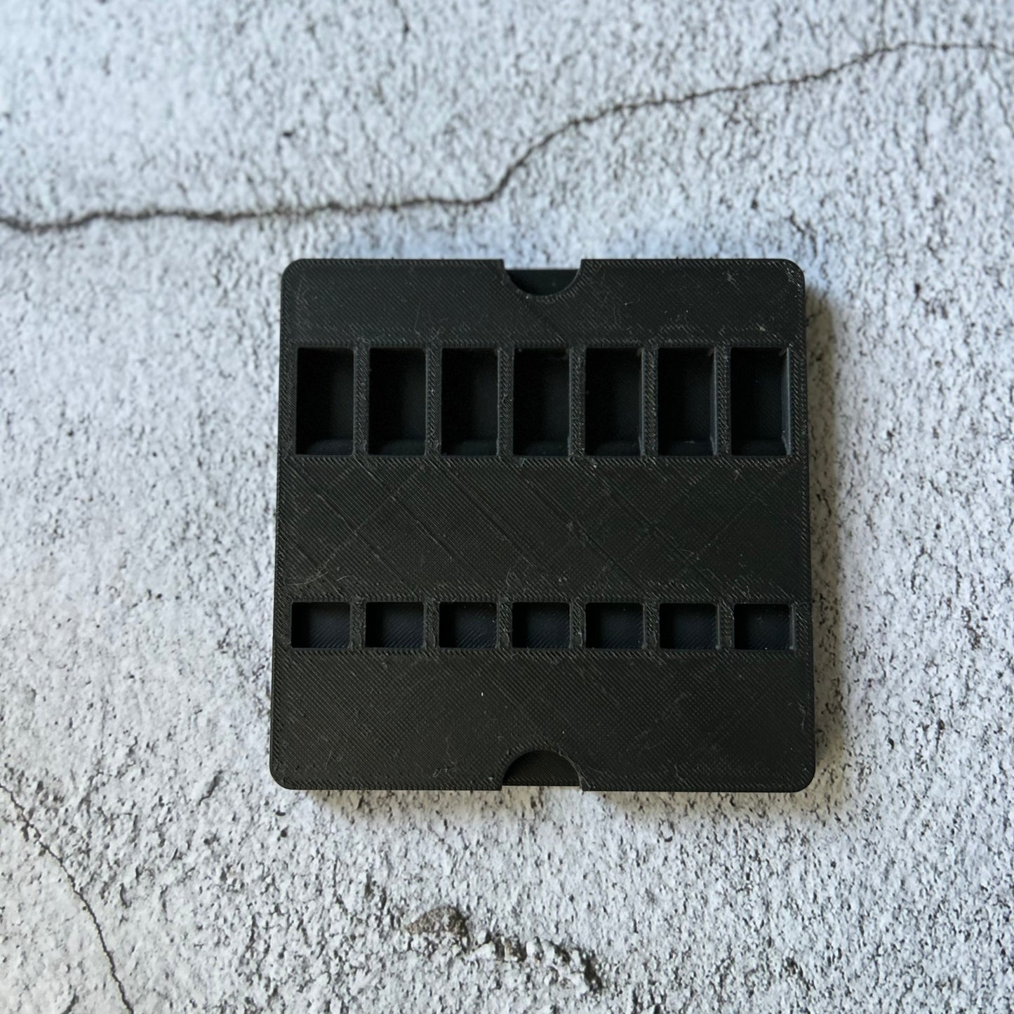 xTool F1 Bottle Opener Jig for up to seven openers. 3d printed specifically for the xTool F1. An xTool XCS layout file is provided as part of the purchase.
