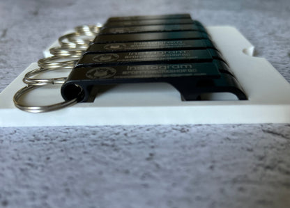 xTool F1 Bottle Opener Jig for up to seven openers. 3d printed specifically for the xTool F1. An xTool XCS layout file is provided as part of the purchase.