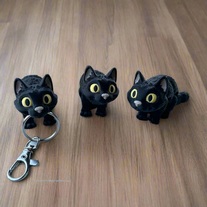 Three black cats