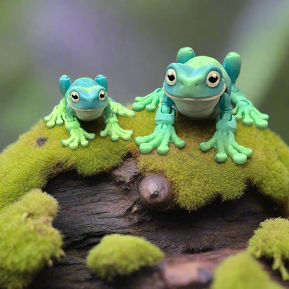 Two tree frogs sitting on a mossy stump