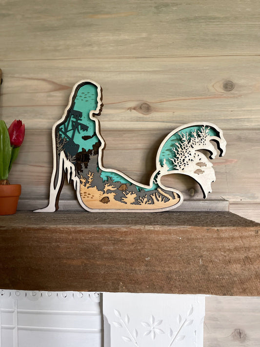 Mermaid made with six laser cut layers painted to create an amazing undersea scene.