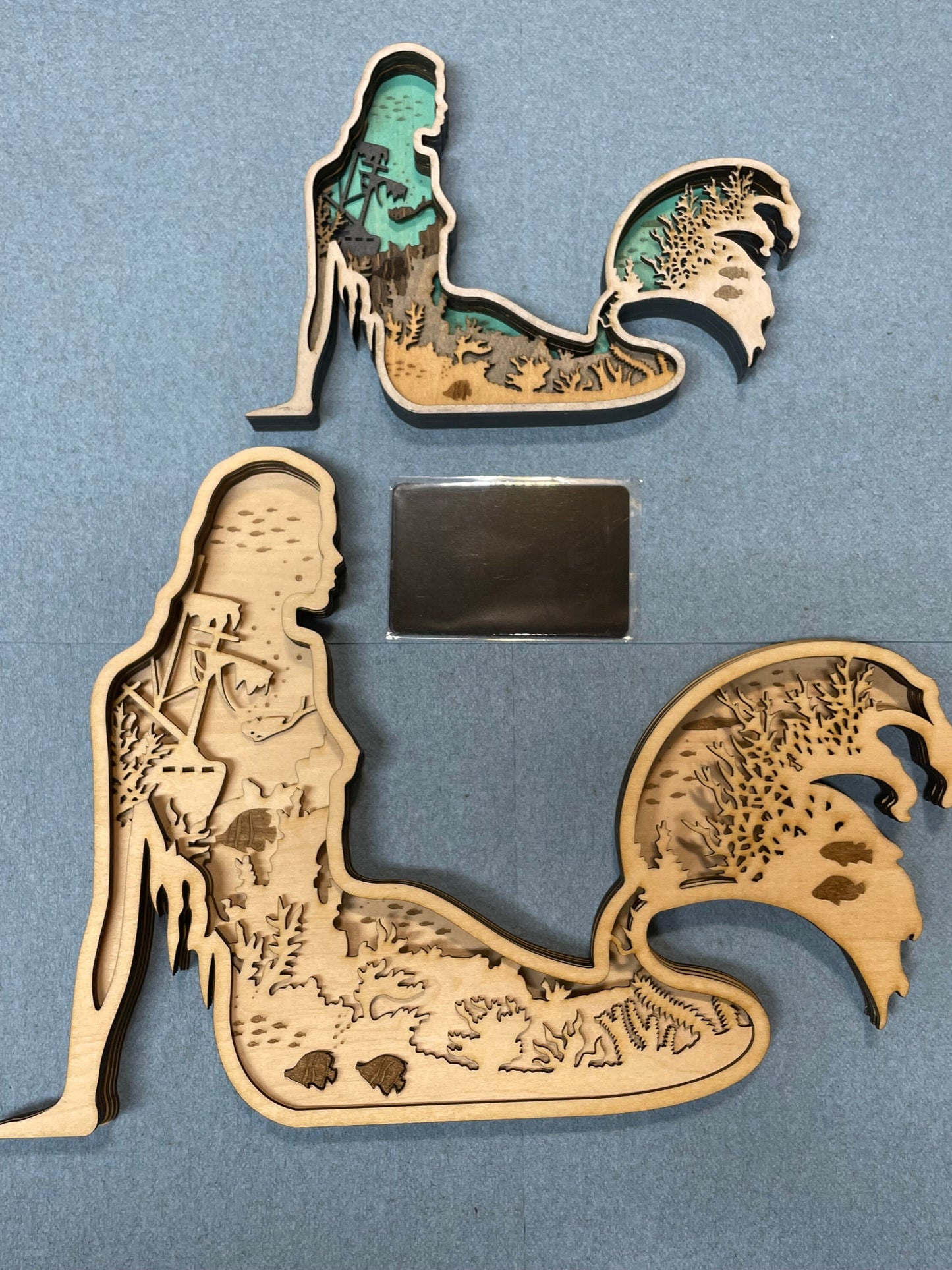 Mermaid made with six laser cut layers painted to create an amazing undersea scene.